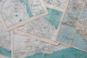 Old maps piled on top of each other