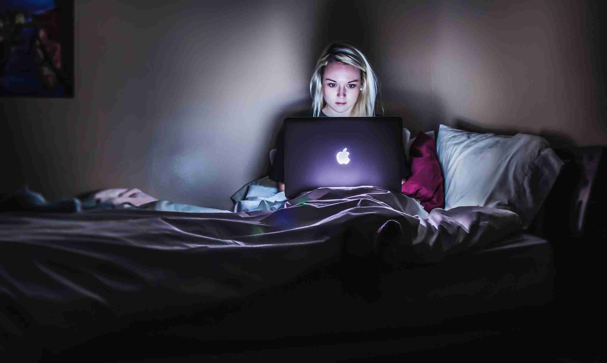 Girl up late on a macbook