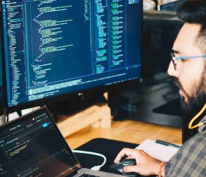 Man writing some code